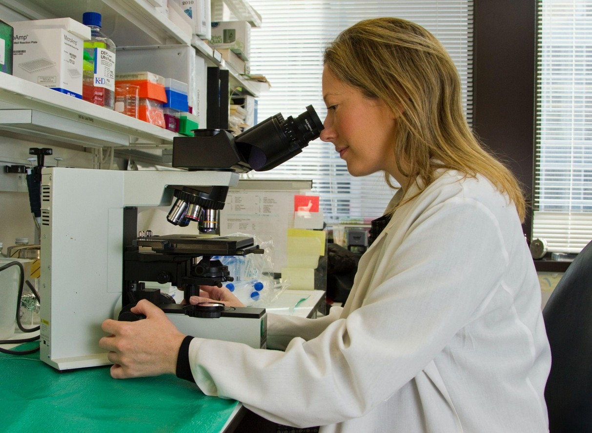 A scientist performing preclinical research in a clinical trial.